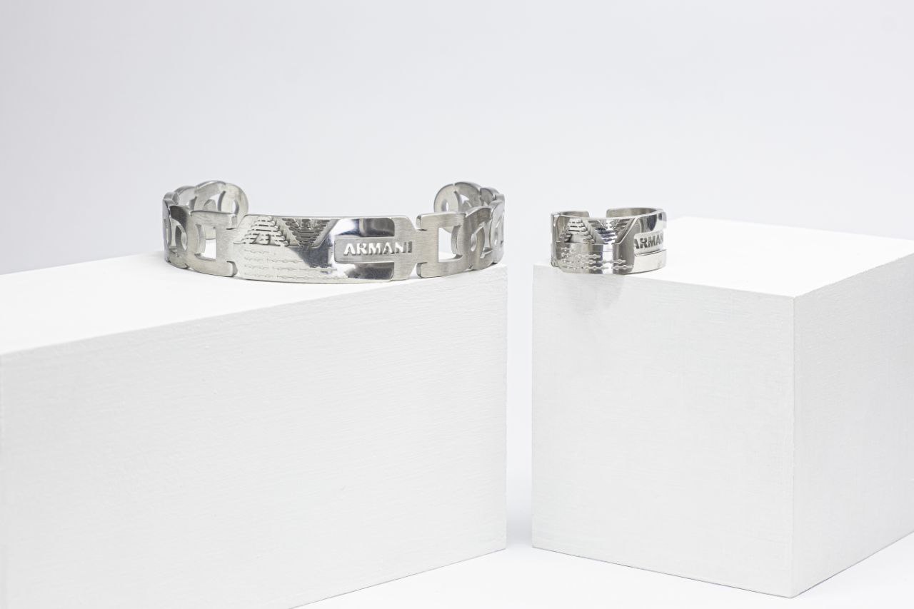 IMG_20250324_182852_649 ست دستبند و انگشتر ARMANI استیل خارجی رنگ مشکی طلایی - Image 1